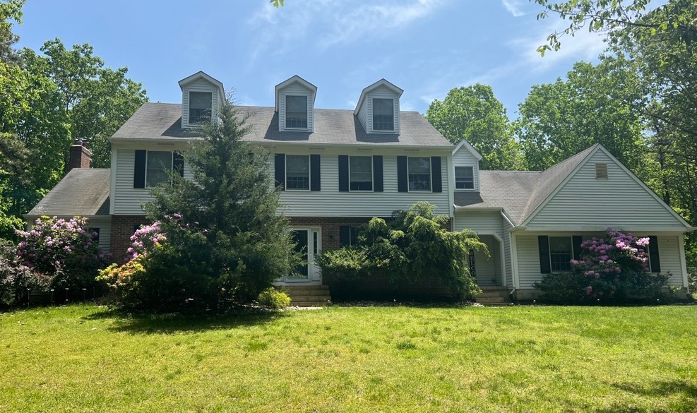House with hail damaged roof