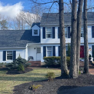 Before and after roof and siding replacement