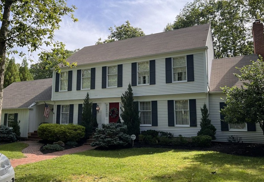 Before and after roof and siding replacement